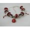 Silver bracelet with red ladybug beads