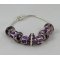 Silver bracelet with purple pearls and rhinestones