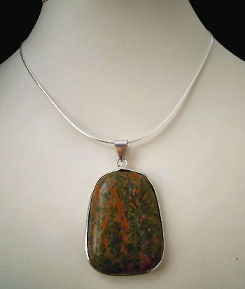 Cabochon pendant set in unakite stone round rectangular shape