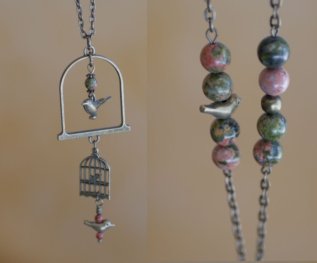 Necklace with long bird pendant