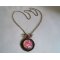 Collier au pendentif vintage et cabochon Papillons tons pêche corail