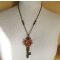 Pendant necklace Key and flowers in pearls on chain