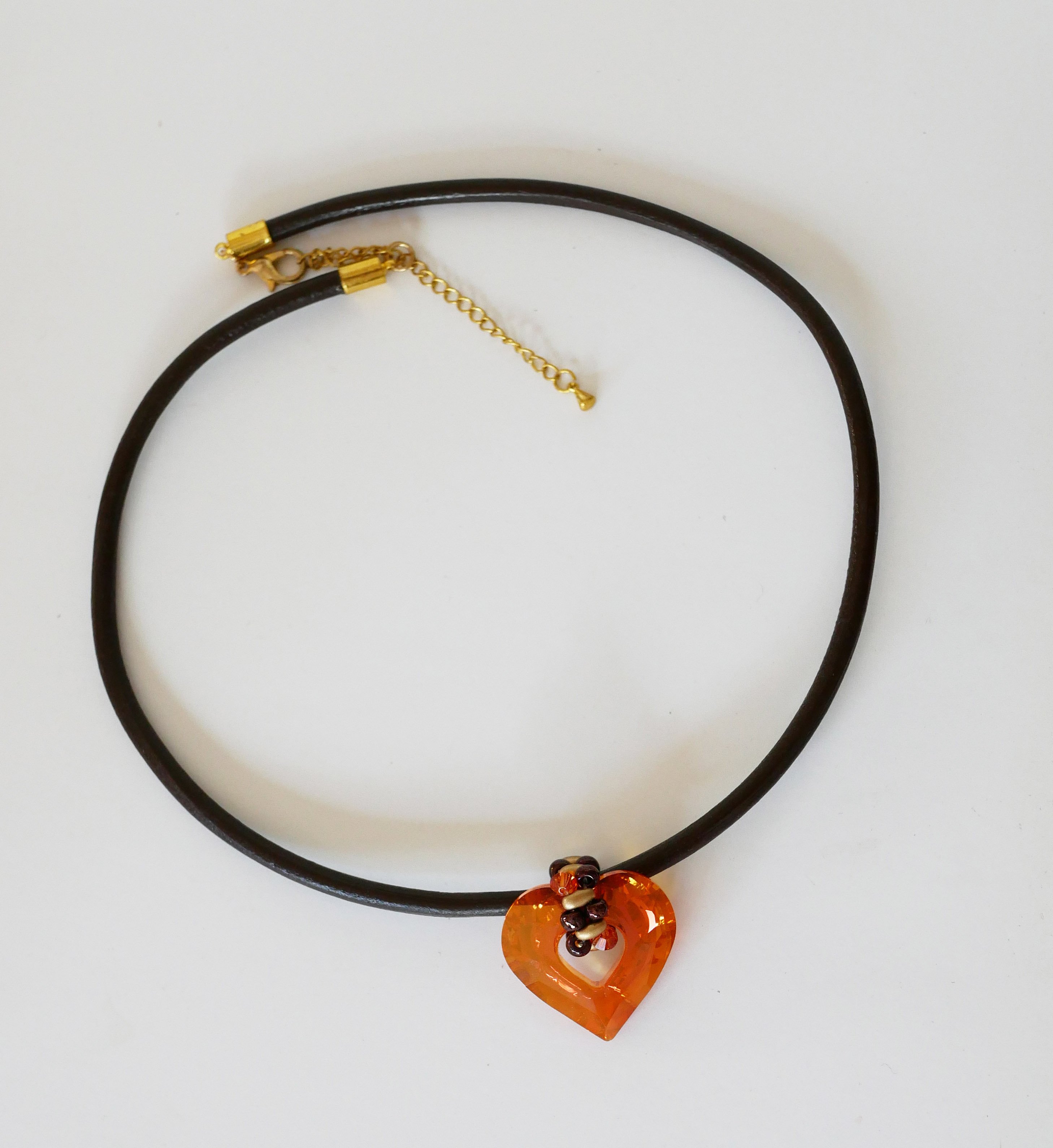 Swarovski heart pendant on brown leather
