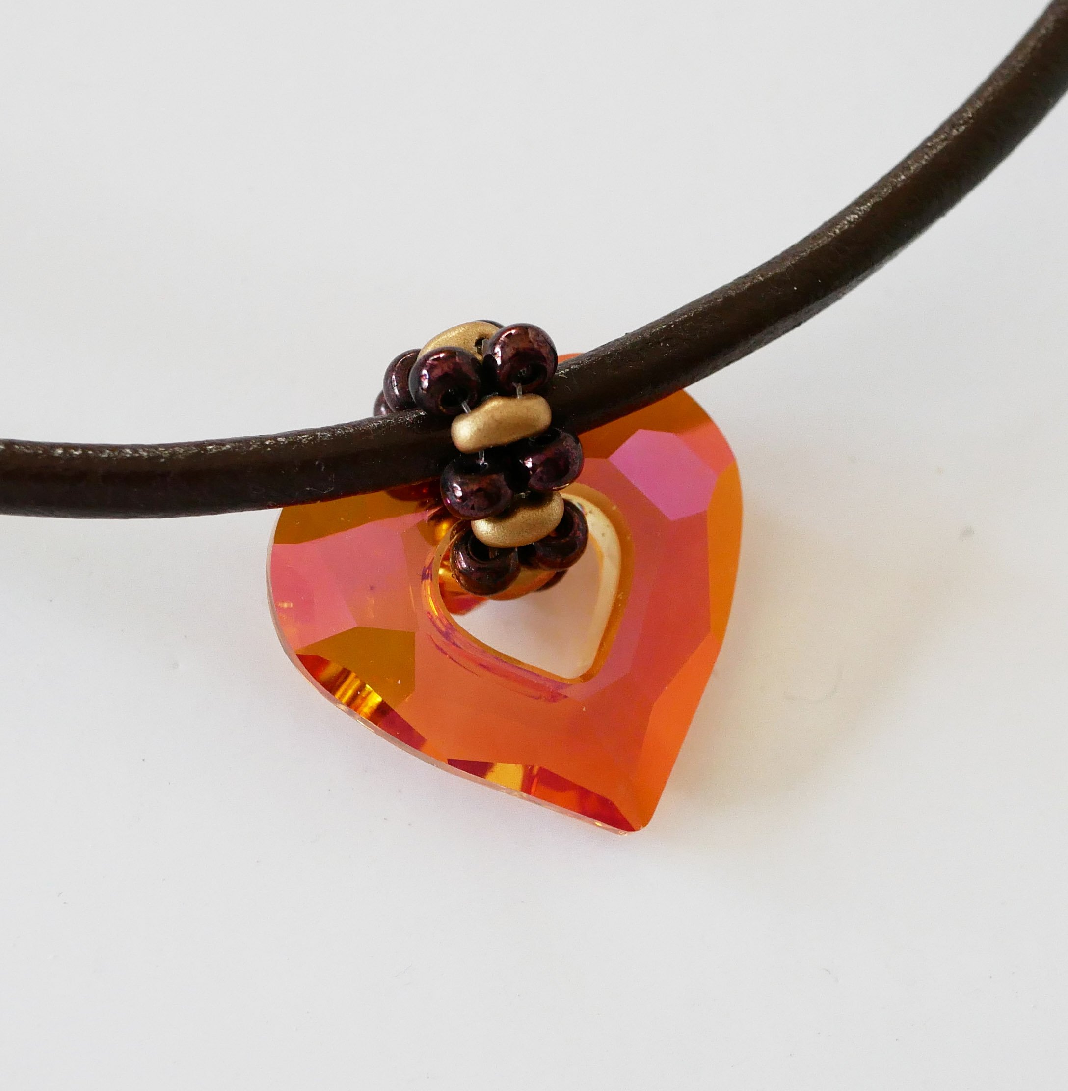 Swarovski heart pendant on brown leather