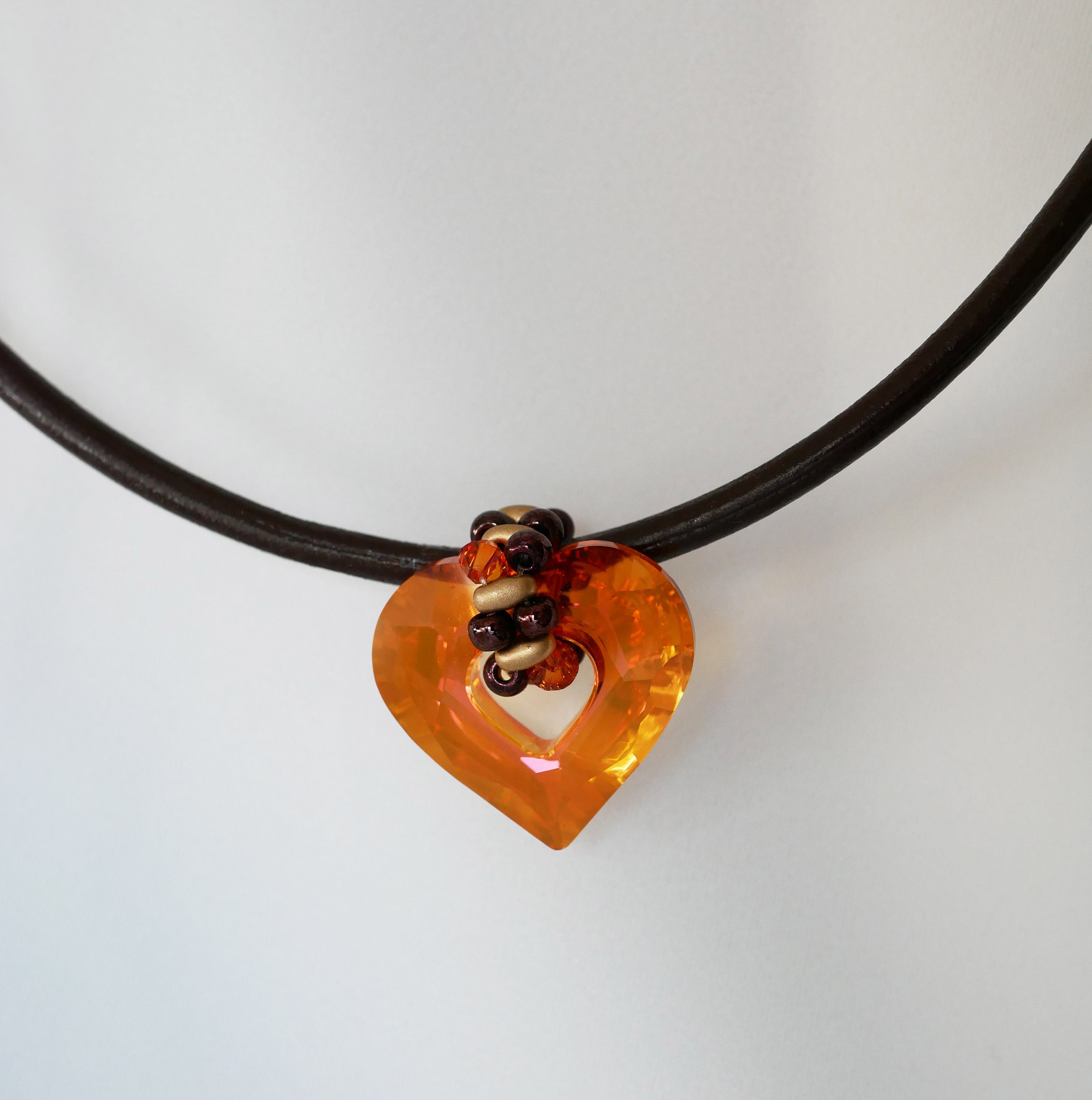 Swarovski heart pendant on brown leather