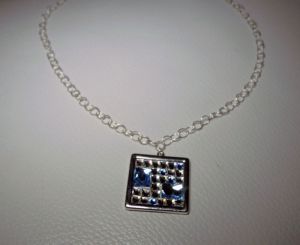 Square medallion pendant with Swarovski cabochons