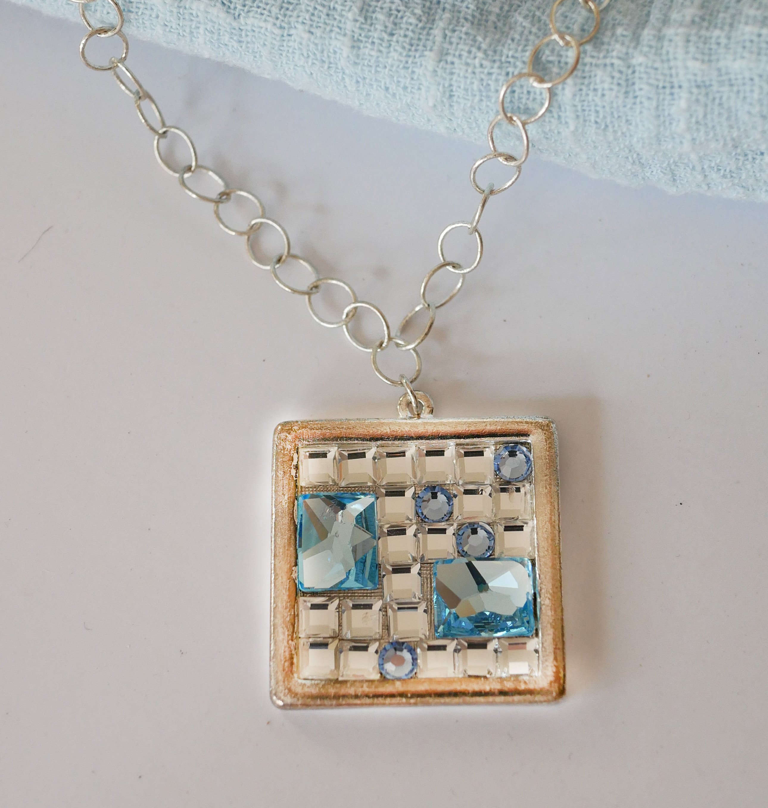Square medallion pendant with Swarovski cabochons