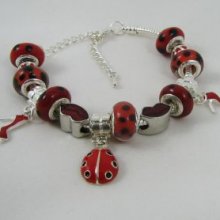 Silver bracelet with red ladybug beads