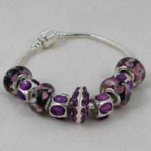 Silver bracelet with purple pearls and rhinestones